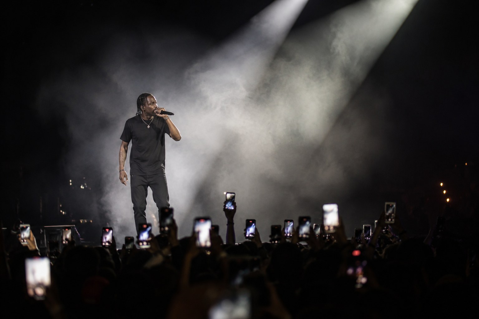 Live performer in stage smoke